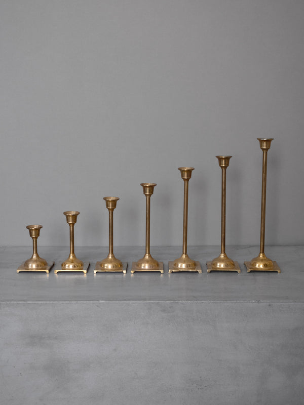 Set of Seven Brass Candleholders